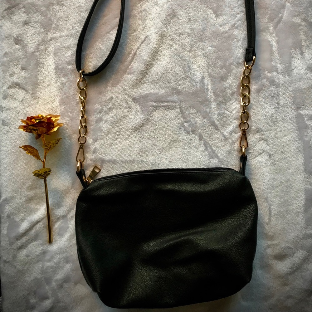 Shoulder or crossbody black and gold purse